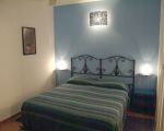 villa-al-mare-schlafzimmer-mit-gemuetlichem-doppelbett.jpg