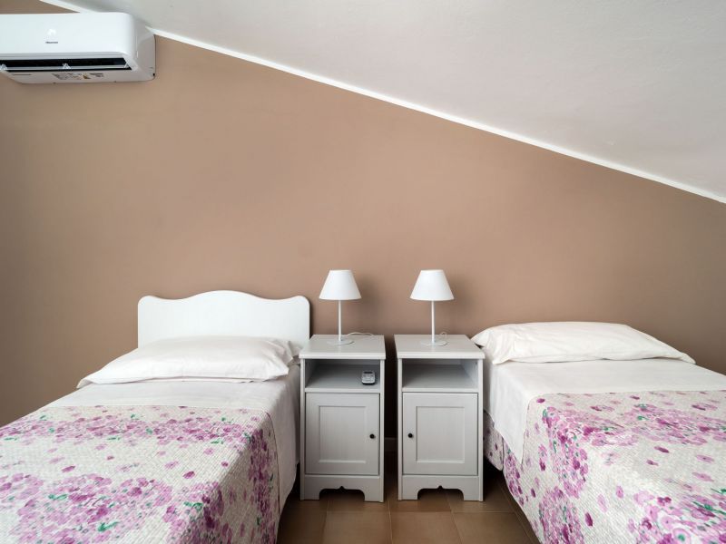 villa-maddalena-schlafbereich-mit-einzelbetten.jpg