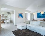 ferienvilla-blumarine-wohnzimmer-mit-gemuetlicher-sitzecke.jpg